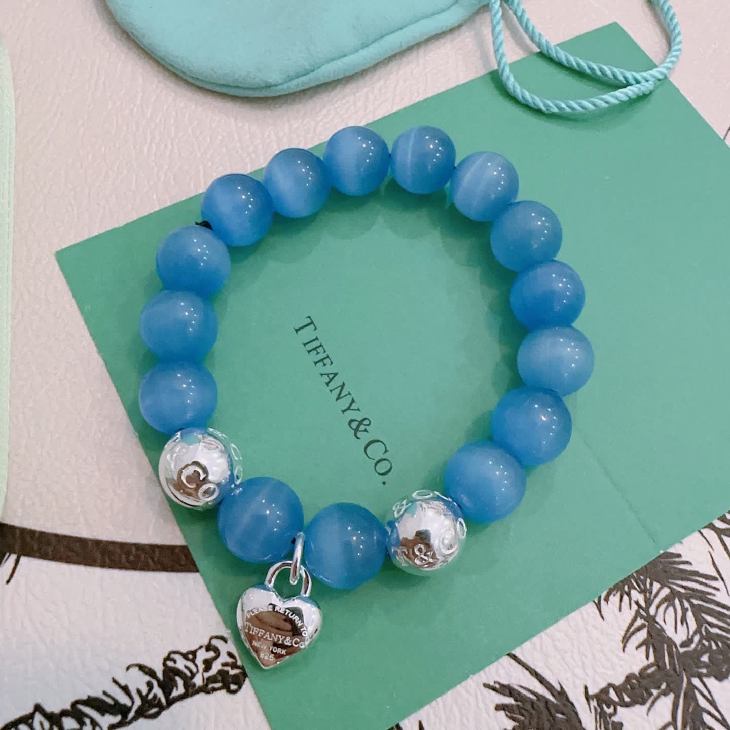 Tiffany & Co. Blue Beaded Bracelet with Lock Charm Tiffany & Co. Blue Beaded Bracelet with Lock Charm